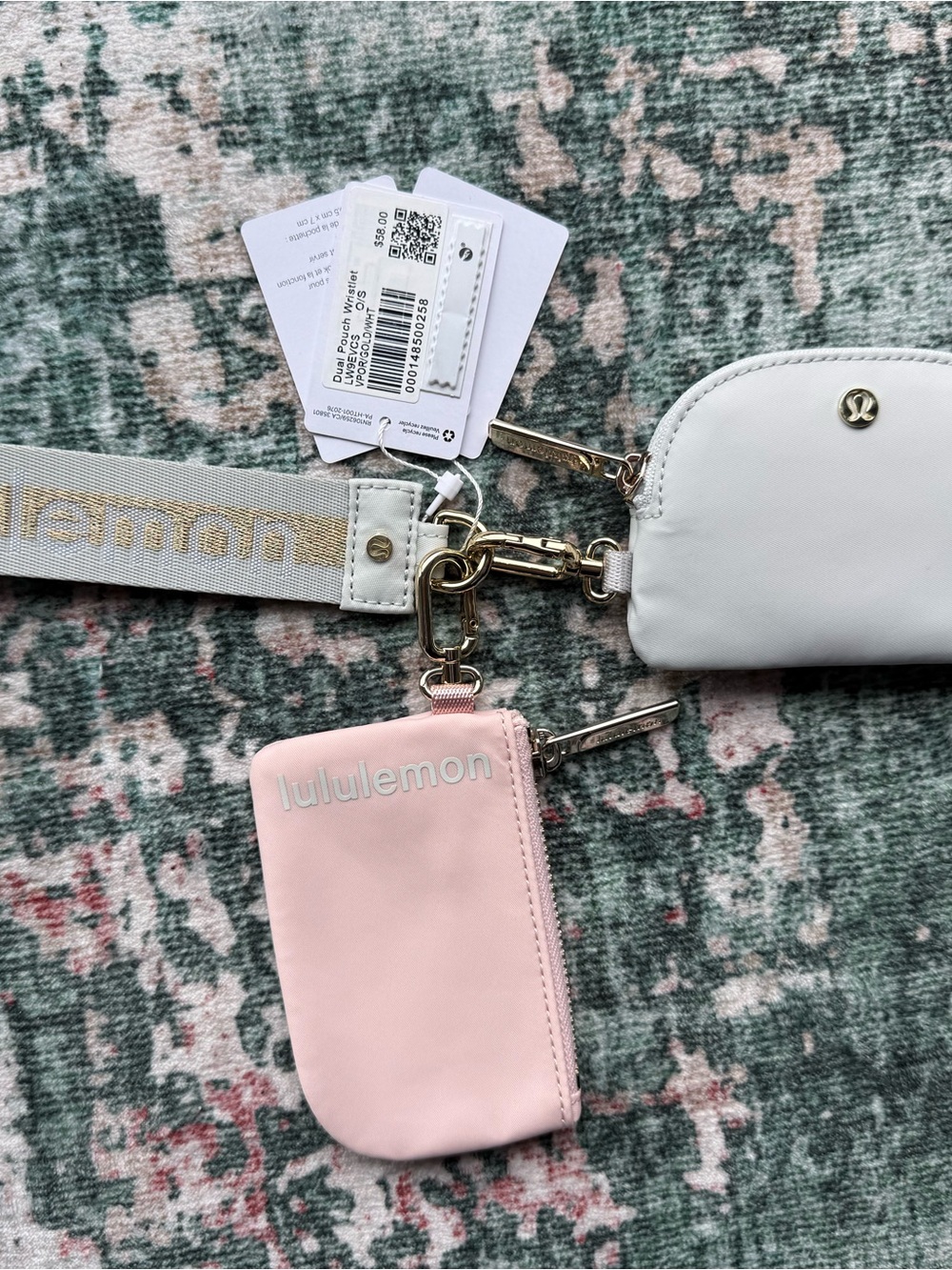 lululemon athletica wristlet. Pink and Grey with Gold Hardware